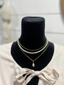 Chan Sutt Pearl Cross Necklace