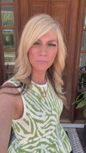 Load and play video in Gallery viewer, Matcha Animal Print Ruffle Peplum Top by Entro

